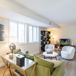 Living room with chairs and couches