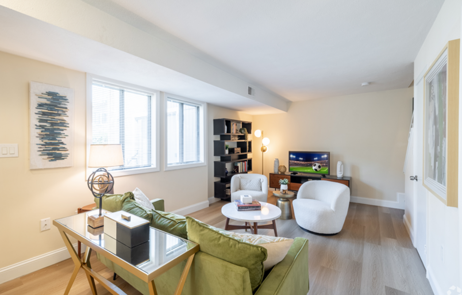 Living room with chairs and couches